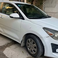 كيا ريو موديل 21  وارد امريكي   السياره ماشي 98 الف  ميل محرك 1600 بيه...