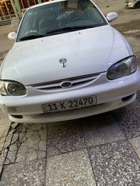كيا سيفيا موديل 2000 صبغ عام بدون ضربه السياره جاهزة النقص بيها راديتر...