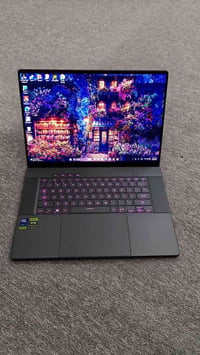 أسوس ROG G16 • RTX ٤٠٧٠ • OLED QHD ٢٤٠Hz