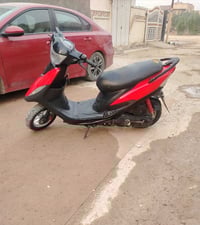 بغداد مدينة صدر • ماكس • دراجة