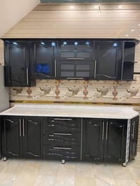 ناصرية الاسكان • منيوم ثقيل • التاج والاناره