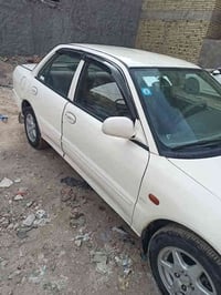 بروتون للبيع موديل 2004 بغداد ابيض محرك كير جيد حداديه جيده مابيه صبغ ...