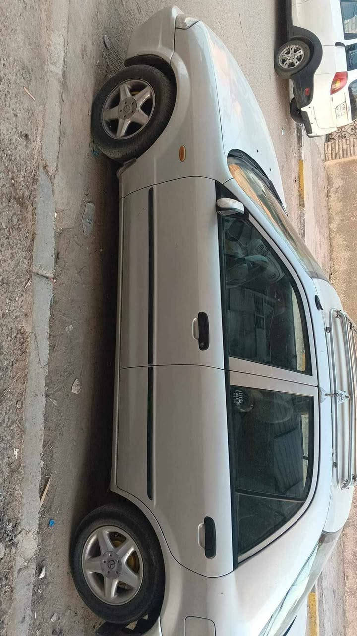 من رخصة الادمن سيارة ماصدة موديل 2000حجم 323 رقم دولي محرك الفين كير اوتوماتيك تبريد شغال تدفئة شغالة تخم تاير  ناعمة جدا اوبلعافية التصير من نصيبة مكانها المحمودية واتساب ***********
