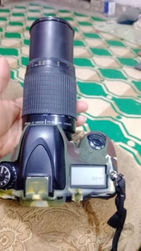 نيكون 610 فول فريم نضافه 98% كلشي ما بيها ما مصلحه كفوله مع عدسه رياضي...