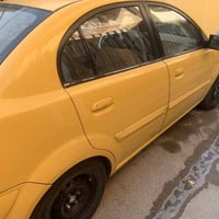 كيا ريو 2011 خليجيه محرك 1600 بيها جاملغ امامي مبدل بدون دواخل بس المس...