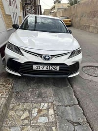 تيوتا كامري 2024  LE هايبرت  ياباني ماشية 69000 الف  رقم بغداد $190 وب...