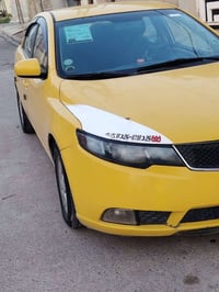 كيا فورتي موديل 2010 محرك 20بشرط اخوان السياره بيها ضربه الجاملغ الخلف...