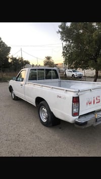 بيك اب  نيسان  شبوط موديل 2002 السيارة بلادية گير ومحرك وصبغ نظيفات لا...