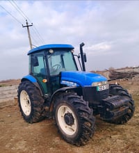 تركتر نيهولند حجم 100 موديل 2011 رقم أربيل سنويه جديده بسمنه 078252390...