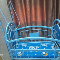 سرير طفل • نضيف • طشاش شارع القادر