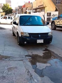 دوج كرفان ٢٠٠٤ بتره رقم نجف مكينة ٣٣٠٠ سته سلندر جديده والوصل موجود من...