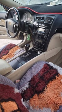 سيارة للبيع • سيارة مستعملة • رقم بغداد • لون اسود • مكينة 2400 • تبري...