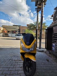 دراجة pcx دراجة نضيفة وخير من الله آي نقص مابية  ماشية 18 الف وسعرها ...