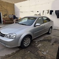 اوبترا موديل ٢٠٠٧ خليجي رقم بغداد السيارة مصبوغة عام اثر الجراد بدون ا...