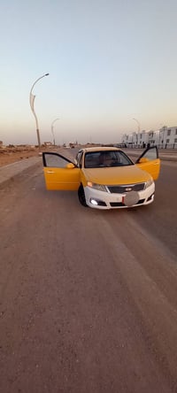 سياره اوبتيمه 2009رقم بغداد باسمي مكينه وكير مال حاويه شرط فرممه حدادي...
