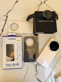 هونر ماجك 8 برو ذ 512 مستخدم قليل  مع ساعه هونر 5 الترا مع كفرات اصليه...