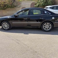 ازيرا ٢٠١٠ خليجي محرك ٢٧٠٠ فول مواصفات(_فتحه_داخل جلد_تبريد قطعتين_حسا...