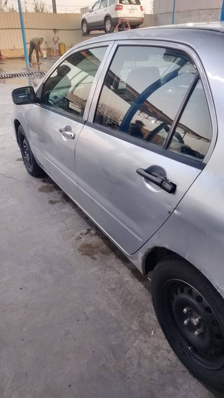 السلام عليكم عندي لانسر ٢٠٠٧ رقم بغداد بسمي السيارة مكفولة من ضربة او صبغ بس خشم الجاملغ لأيمن بية تصليح كير و محرك جيد جدا كهربائيات كل شغاله السعر ٦٨ وبية مجال حك الجية مكان السيارة في مدينة بسماية  ***********  بية وتس اب
