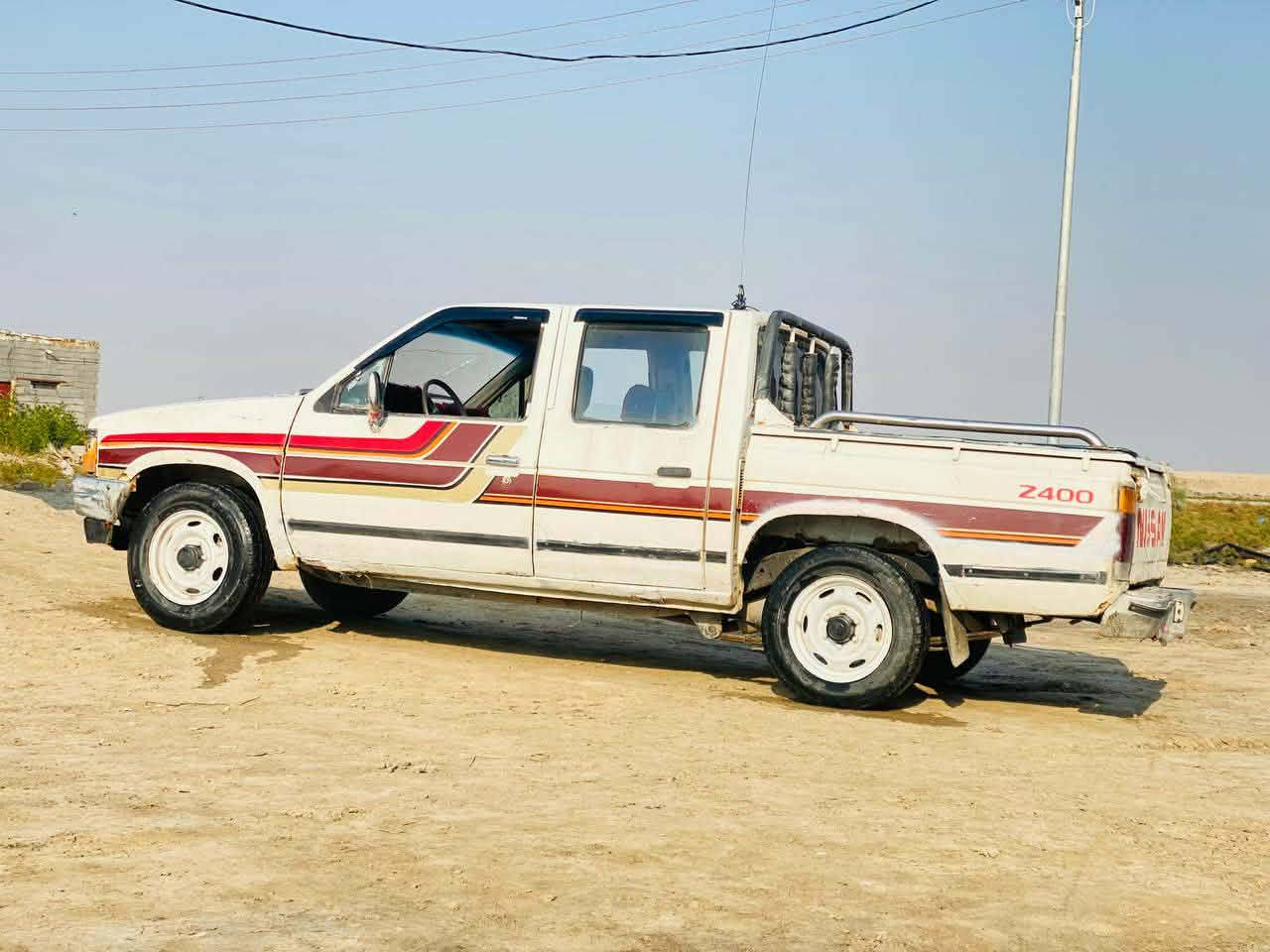 سلام عليكم للبيع نيسان مديل 87رقم ذيقار مشروع وطني شرط تحويل محرك مكفول نضيف كلش حاويه كير مكفول شاصي مكفول سياره مكفوله من الضربه والكلبه بلاد لشرط ماعده مكانات قليله فقط  جاهزه من كلشي مالت جناي تريك وين ماتريد سعر 25وبيه مجال *********** مكان سماوه الخضر خابر وبيك خير وتدلل
