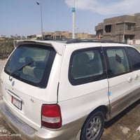 كيا كرنفال 2000 رقم بغداد مكينه گاز جديده كير عادي بيه خلل 3و4 حداديه ...