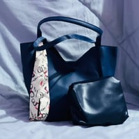 جنطة كبيرة • جزدان صغير • توصيل