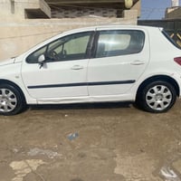 بيجو307مكفولة من صبغ وتبديل محرك وكير مكفولات حدادية جديدة كهربائيات ج...