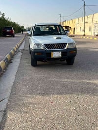 ميتسوبيشي • ٢٠٠٤ • رقم بغداد
