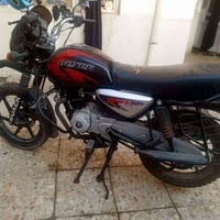 دراجه بوكسر ٤٢٥ وبيه مجال قليل أوراق سكنر 07881171284