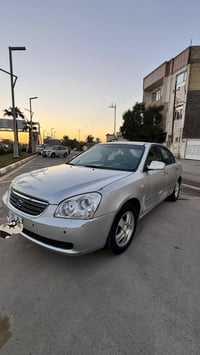 متاح للبيع سيارة كيا اوبتمة مديل 2007 محرك 4 سلندر رقم انكليزي جديد بأ...