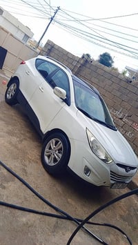 توسون ٢٠١٠ • توماتيك • كاميرا