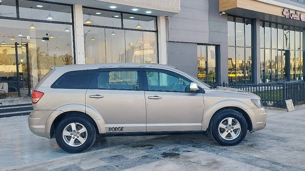 دوج جورني مديل 2009وارد امريكي كلين مكفوله من الضربه والتبديل رقم مميز بصره نكليزي سنويه لل28مشروع وطني السعر 95وبيه مجال للستفسار اكثر ***********مواصفات داخل بيجي مثبت سرعه كشنات مخمل مكينه وكير مكفولات حجم لمحرك 6سلندر 7راكب ثلث قطع تبريد تخم تاير كهربائيات كلهه شغاله كشن كهربائي حداديه جديده سياره جديده وجاهزه  وأي نقص مابيهه المكان الناصريه مركز الشطره, ذي قار
