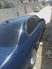سياره بي ام 525 موديل 89 السياره مكفوله ومصبوغه جماليه رقم بغداد سنويه...