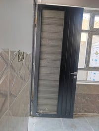 معمل وحدادة • ابواب شبابيك المنيوم • موصل صناعة الكرامة