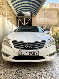 ازيرا 2014 • 6 سلندر • رقم نجف