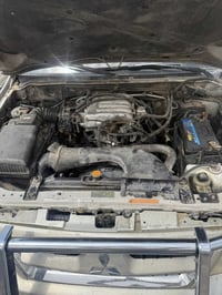 للبيع باجيرو 2006 رقم انكليزي باسمي بغداد  السيارة بيها ضربه باب الخلق...