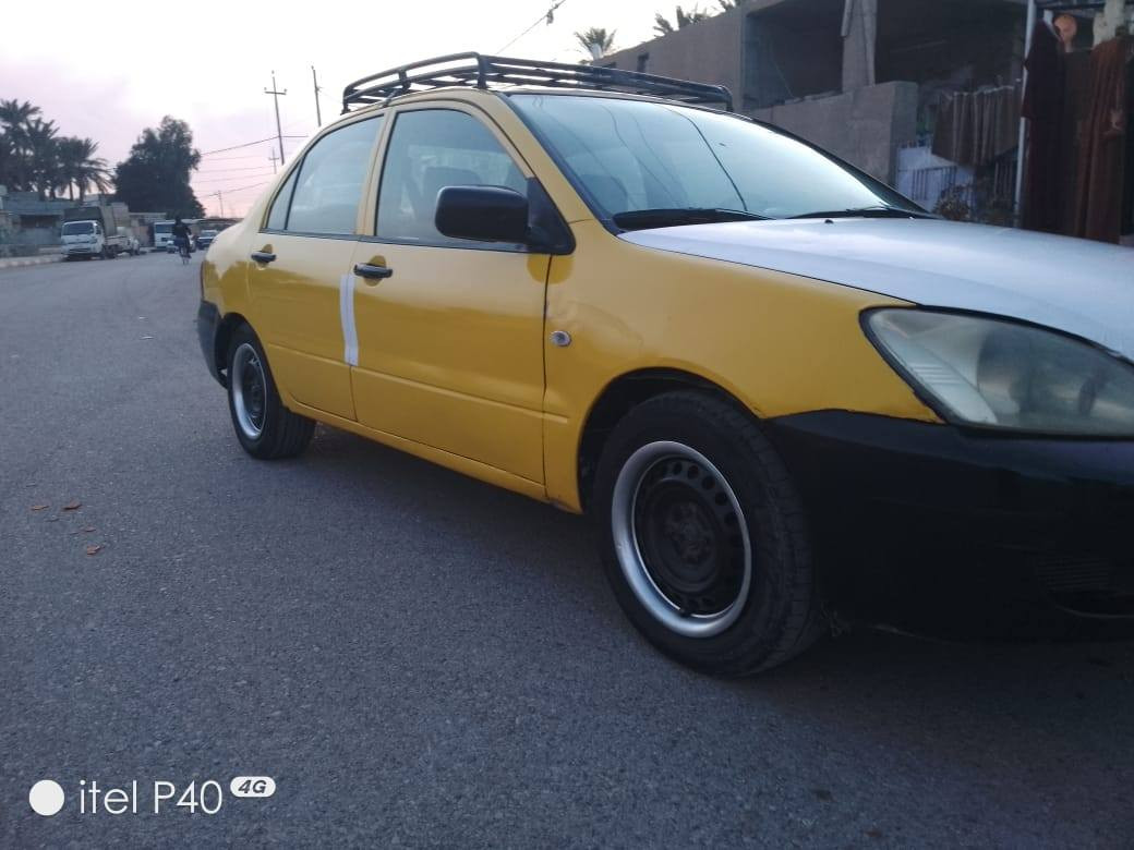 لانسر 2010 رقم صلاح الدين سنوية جديده كير عادي بدون ضرر فقط صبغ حزام سياره جاهزة السعر 54 رقم الهاتف ***********
