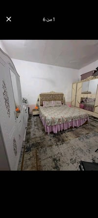 النجف حي الوفاء • ٥٠م • غرفتين نوم