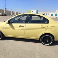 اكسنت شركه عامه 2011سياره بلادي بيه تلحيضات موضحه بل صور رقم  بغداد جا...