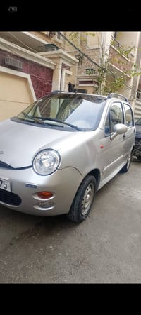 كيوكيو موديل 10 ماشيه 86مكينه وكير جديده سياره بسمي تبريد ثلج تخم  تاي...