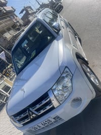 باجيرو حبتور موديل١٤ صبغ ربع چاملغ خلفي رقم شمالي ٠٧٧١٠٩٠٤٠٢٦