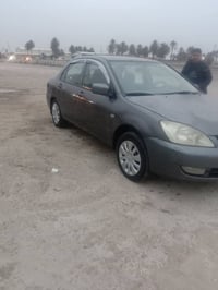 للبيع لانسر بومه موديل 2011 محرك 1500قبق ابيض محرك وكير خير من الله تب...