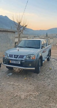 بۆفرۆشتن پیکاب نیسان 2006 بەشەرتی گێرەمەکینە پاکو پوخت سحری130$گەلا رە...