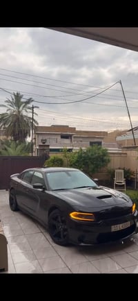 جارجر RT 5700 للبيع 2022 رقم بغداد باسمي ماشيه 40 الف السياره جديده كل...