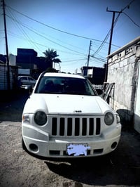 من رخصة الادمن جيب كومباس 2009اوتو مكينة وكير مامفتوحات مكينة 2400  سي...