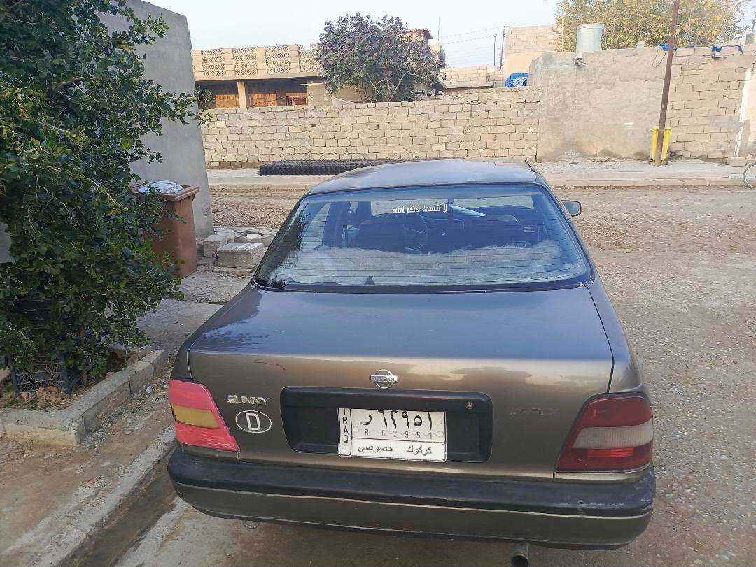 نیسان سنی1992 لدیە دفتربانزین بدون غرامة سعر33

