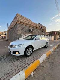 اوبتيما ٢٠١٠ • ماشيه ١٠٠ الف • رقم بغداد