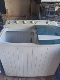 غسالة ملابس • شغالة • غسل وتجفيف