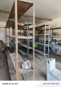 رفوف حديد كاملات عدد اربعه ثنين طولهن 5 متر رتفاع 2.5 ثنين 4 متر الاست...