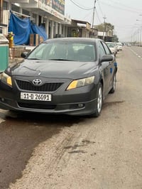 كامري 2008  محدث 11سبورت رياضي اربع سلندر وارد امريكي صبغ حزام رقم بغد...
