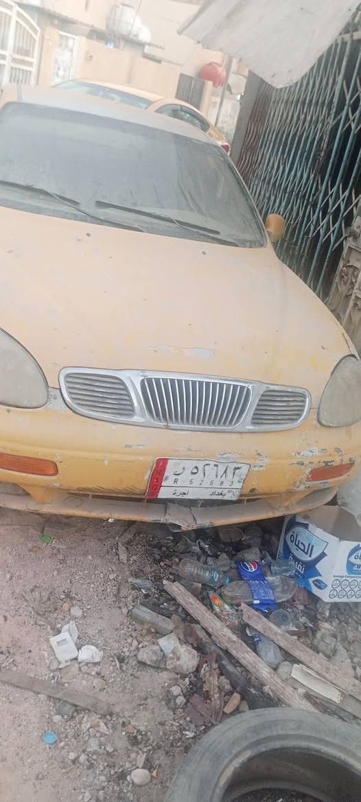 سلام عليكم سياره دايت لكانزه موديل 1999 رقمها بغداد  سياره تشتغل مابيها شي نقصها باتري والكير  بي خلل بل نمره مالته ما يبدل مكينه وكهربائيات السياره كلها شغاله أصل السياره خصوصي لونها  الأصلي القديم سلفر بحري ومحوله تكسي صفره يعني ترجع خصوصي جيب باتري وياك اشغلها الك جانت بيد سائق وعافها  ابيع تسقيط هاذ رقمي للاستفسار *********** /*********** سعرها 12ورقه قفل مستعجل عل بيعه اتصل وادلل
